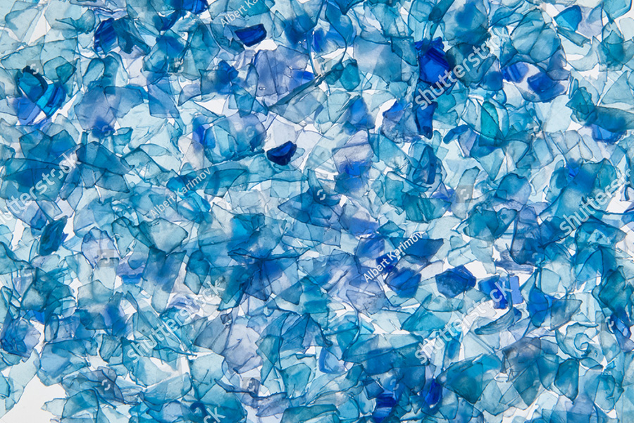 Pellets_0000_stock-photo-background-of-the-pieces-of-plastic-bottles-blue-colored-sliced-pieces-pet-of-bottles-570146872